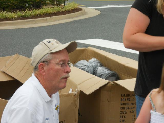 Jim Smith helping fit bike helmets
National Night Out 2011